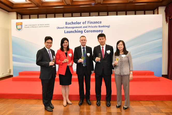 Mr. Joseph Chan, Under Secretary for Financial Services and the Treasury, The Government of Hong Kong SAR (first left); Ms. Amy Lo, Chairman, Executive Committee of Private Wealth Management Association (second left); Professor Ian Holliday, Vice-President and Pro-Vice-Chancellor (Teaching and Learning), HKU (middle); Professor Hongbin Cai, Dean of Business and Economics, HKU (second right); and Professor Anna Wong, BFin(AMPB) Programme Director, Professor of Practice in Finance, Faculty of Business and Economics, HKU (first right) lead the toasting.