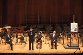  At the Concert, three Arts Faculty academics presented gifts to the Vice-Chancellor -- a piece of music composed by Dr Chan Hing-yan (first from the left); a poem written by Dr Page Richards (third from the left) and an artwork designed by Professor David Clarke (fourth from the left). Professor Daniel Chua (second from the left), Head of HKU’s School of Humanities and the Co-Convenor of “An Anthem for HKU” Gala Concert, presented the gifts on stage with three academics.