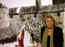Sara Atzmon in front of her painting (Hair , Oil on canvas, 210 x 250 cm, 1996)