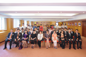 Group photo of Mrs Yao (front left five) and daughter (front left four), Po Leung Kuk Board of Directors and Advisors, as well as students of PLK Yao Ling Sun College and rehabilitation services users.