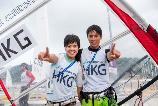 Hayley Chan (left, with fellow medalist Cheng Kwok-fai) wins gold at the 2014 Asian Games (Photo courtesy of the Sports Federation & Olympic Committee of Hong Kong, China)