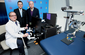 A novel surgical robotic system (NSRS) developed by Prof Law (left), Prof Yeung (middle) and Prof Yung (right) is capable for single incision or natural orifice (incision-less) robotic surgery.