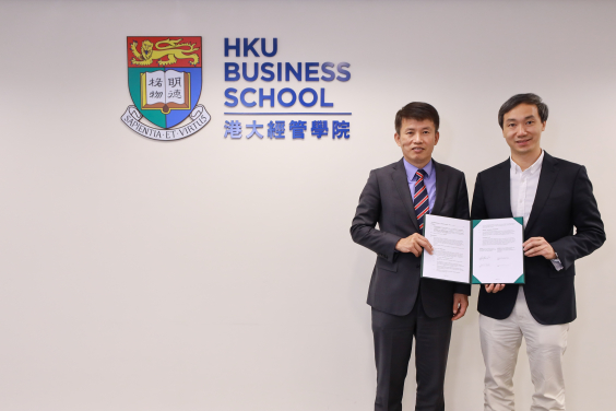 Professor Hongbin Cai (Left) and Professor Chen Lin (Right) celebrate the establishment of the HKU-UCAS FinTech Lab.