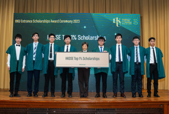 Maurice (first on left) is awarded the HKDSE Top 1% Scholarship.